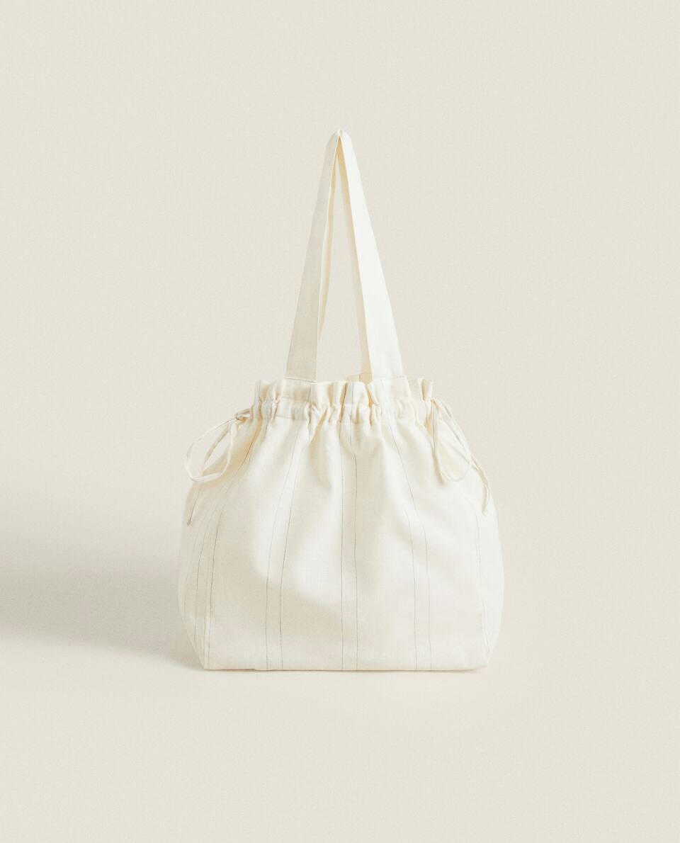 STRIPED TRAVEL LAUNDRY BAG