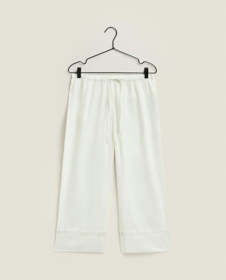 CROPPED TROUSERS WITH LACE TRIM