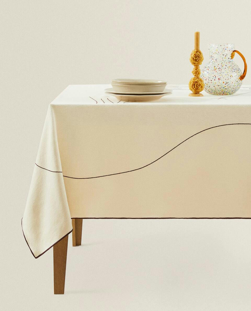 MULTI-PURPOSE FABRIC WITH EMBROIDERED BIRDS