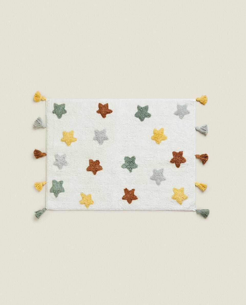 CHILDREN'S BATH MAT WITH POM-POM STARS