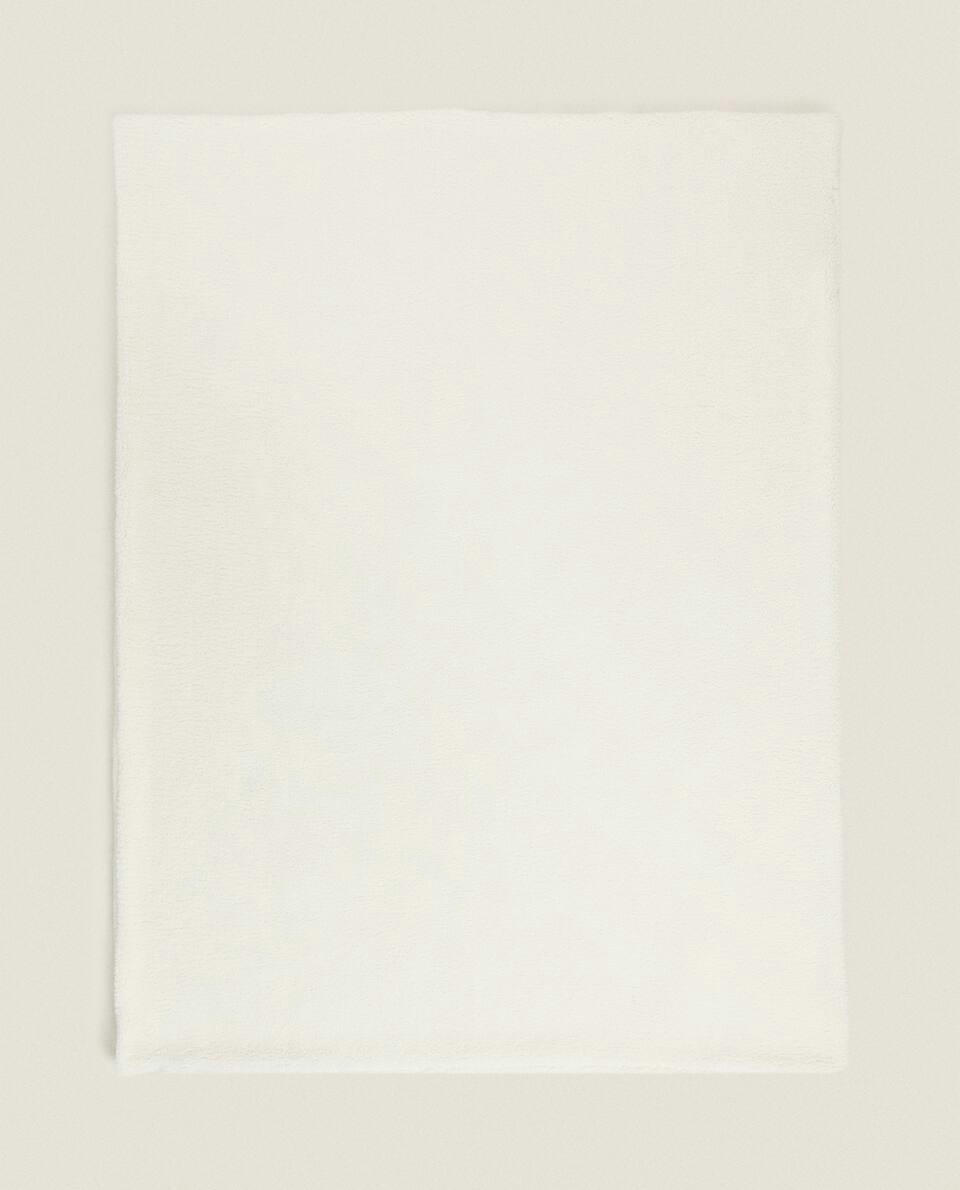 REVERSIBLE FLEECE BLANKET