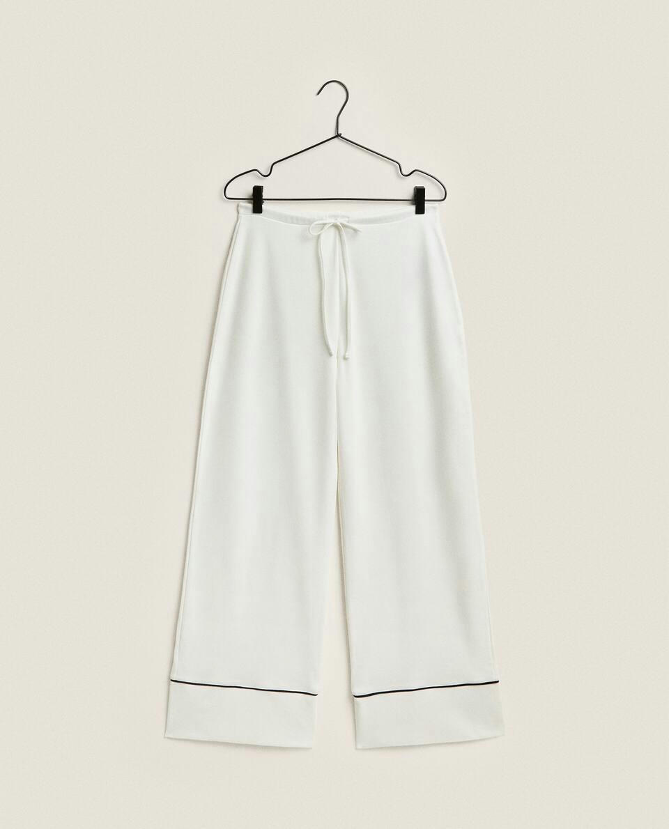 TROUSERS WITH CONTRAST PIPING