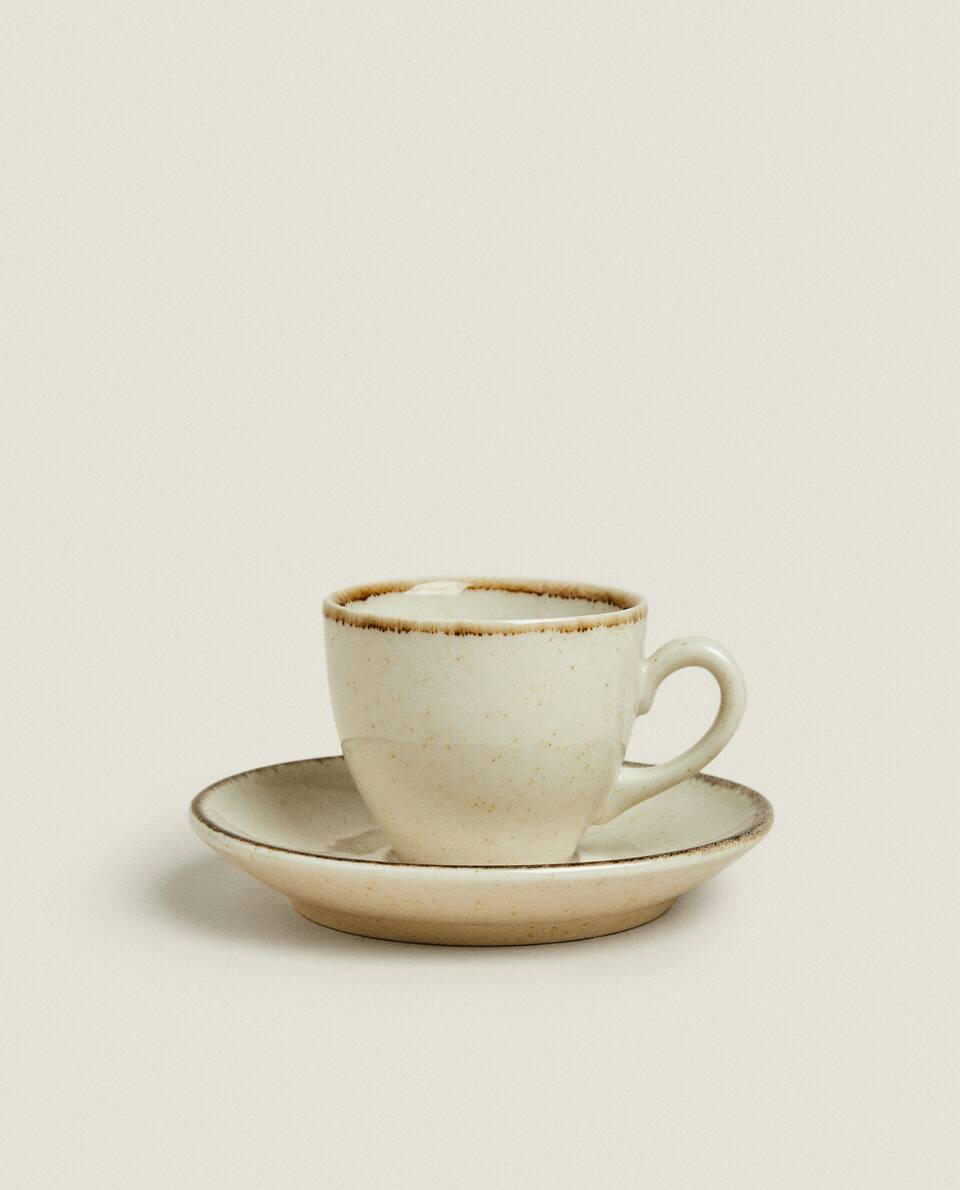 RIMMED COFFEE CUP