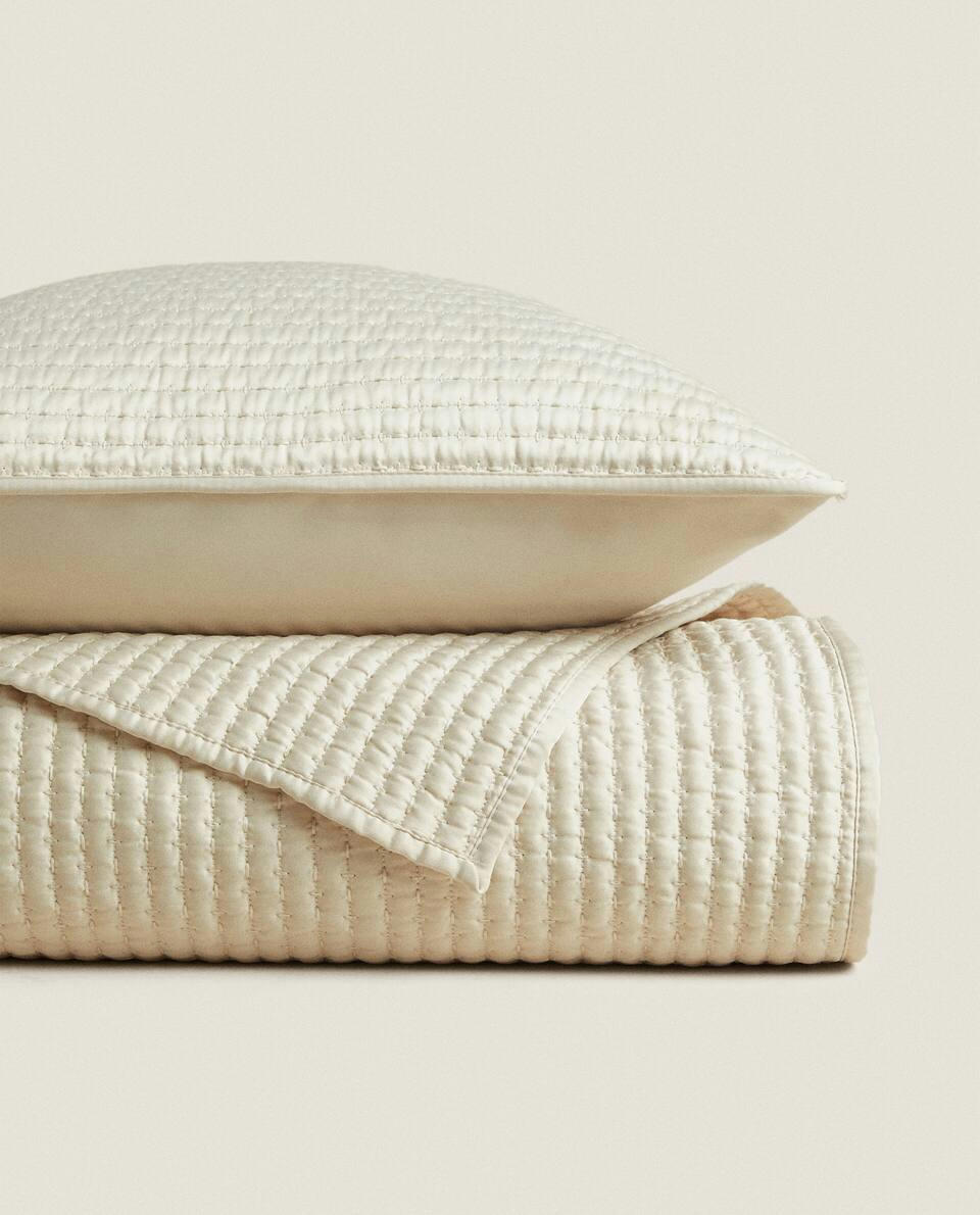 QUILT WITH TOPSTITCHING