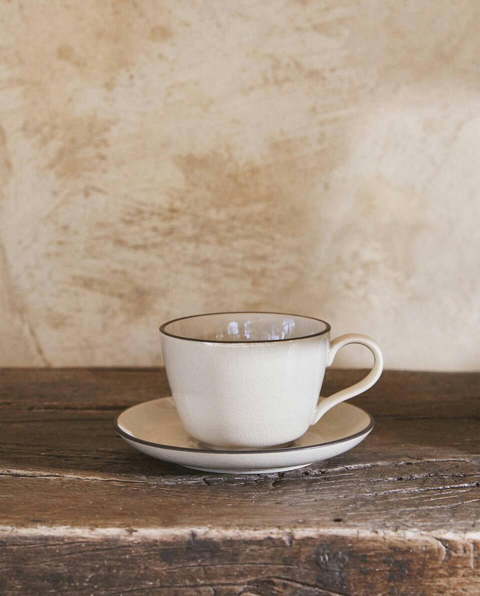 STONEWARE TEACUP WITH RIM DETAIL