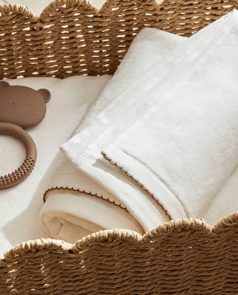 VELOUR TOWEL WITH TRIM DETAIL