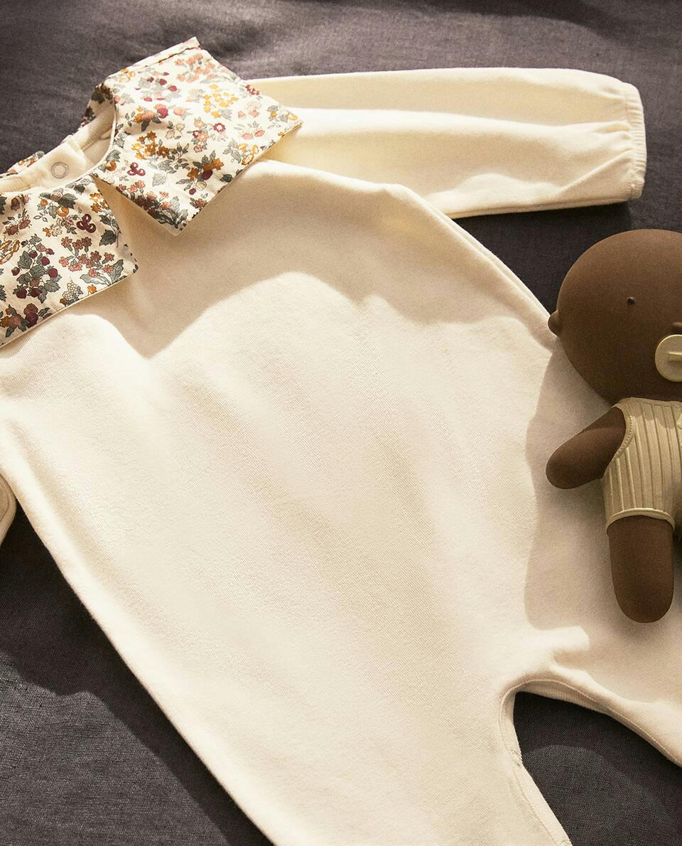 FLORAL PRINT FABRIC CHILDREN'S ROMPER SUIT WITH COLLAR DETAIL