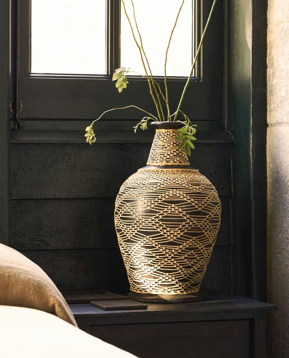 TERRACOTTA AND RATTAN VASE