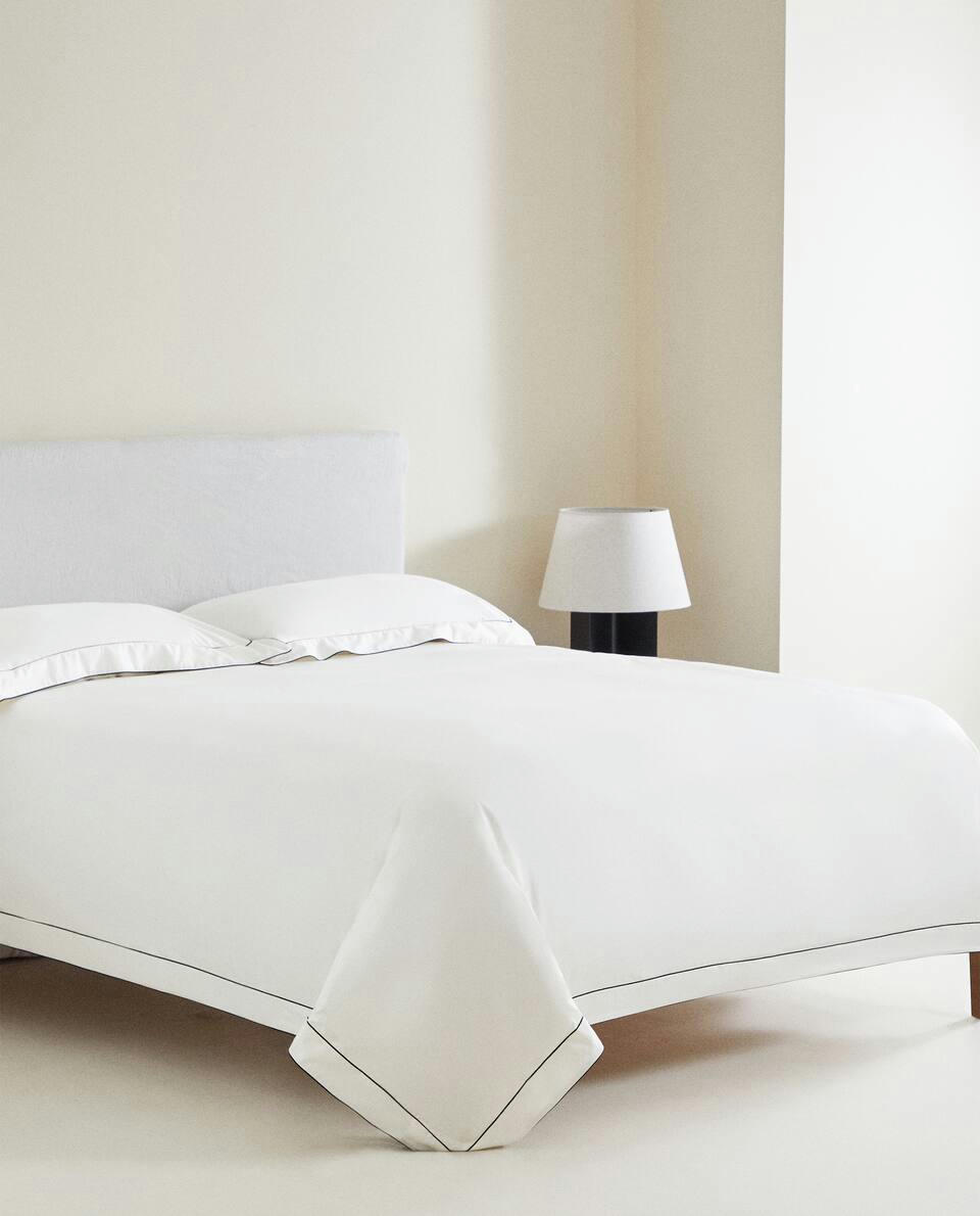 DUVET COVER WITH COLOURED DOUBLE PIPING DETAIL