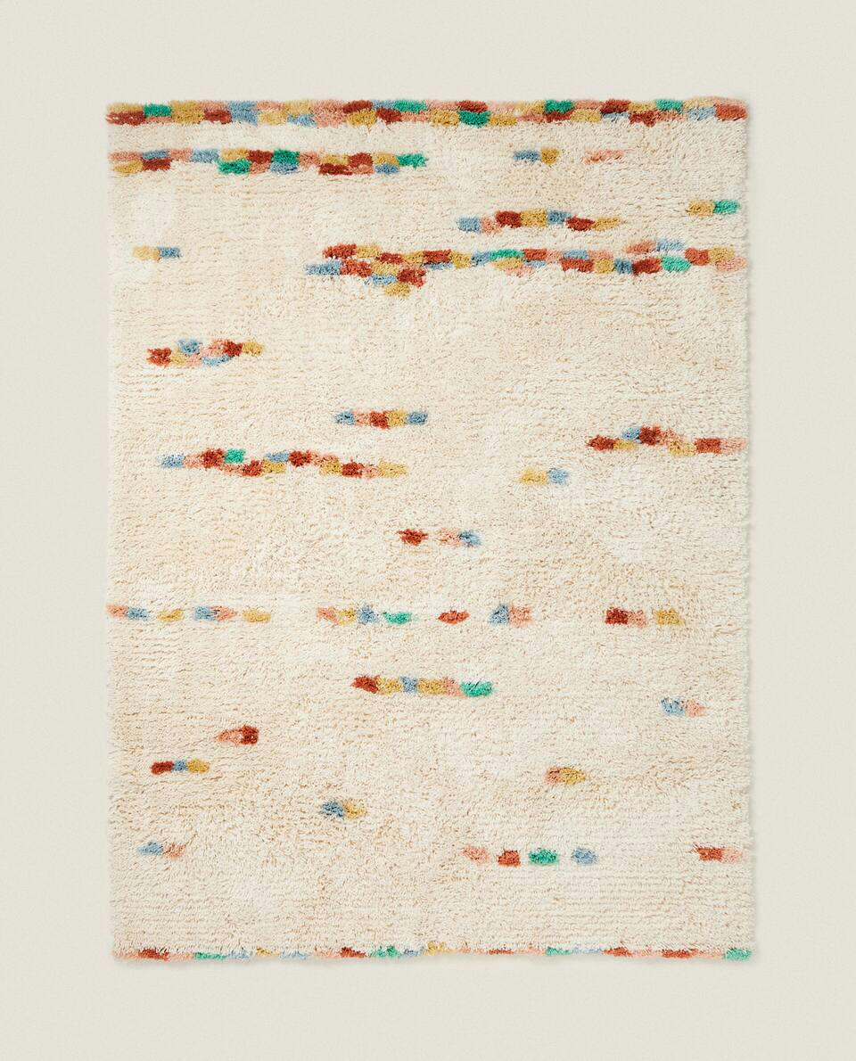 COLOURED WOVEN RUG