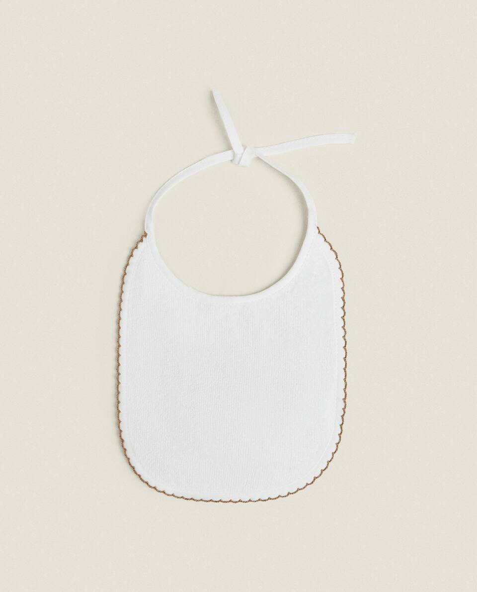 VELOUR BIB WITH TRIM DETAIL