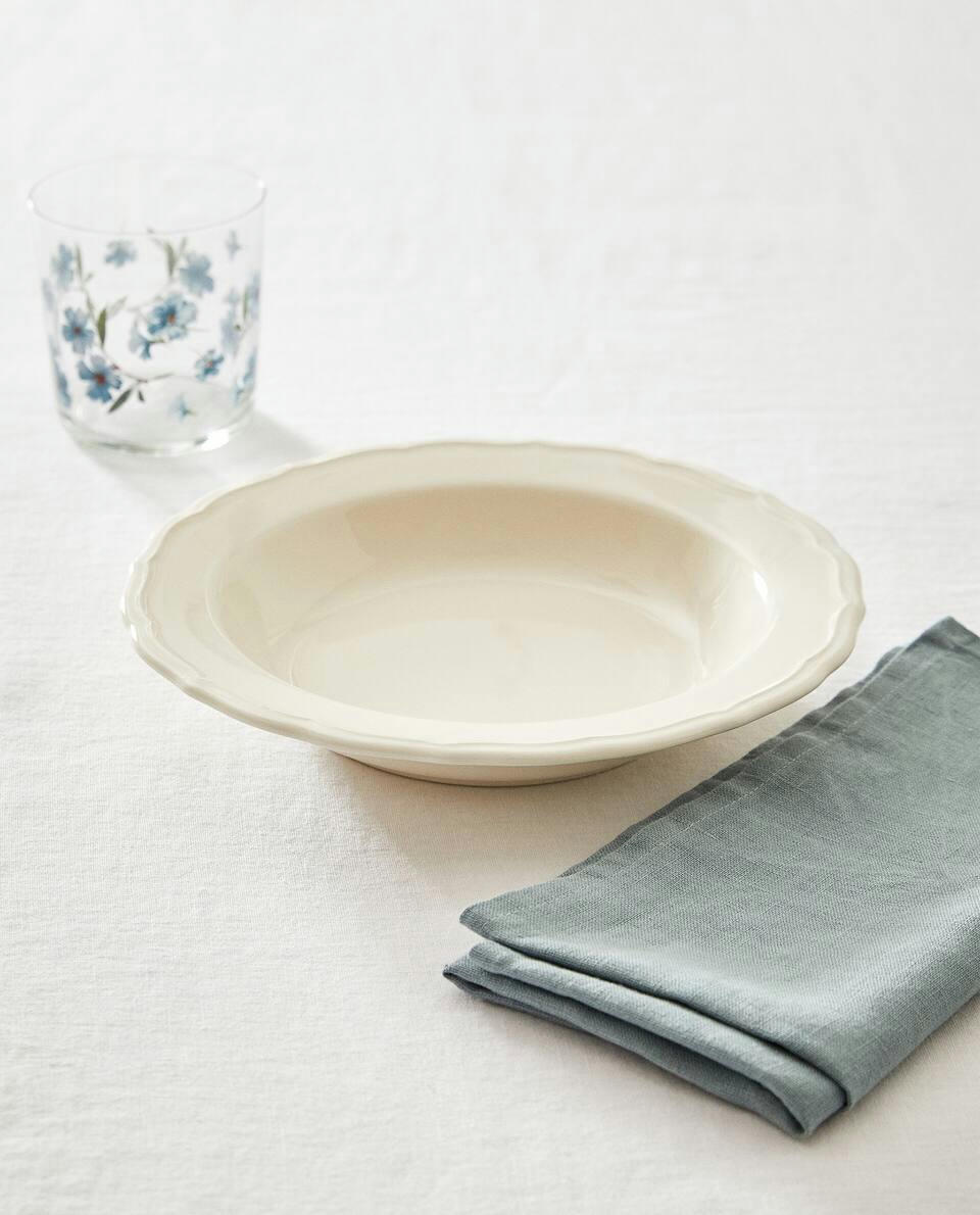 EARTHENWARE SOUP PLATE WITH RAISED-DESIGN EDGE