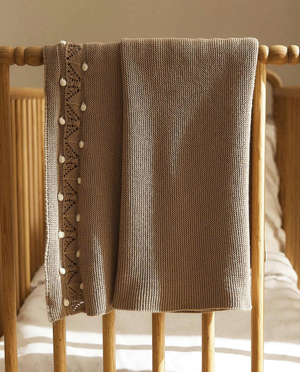 KNIT BLANKET WITH BORDER