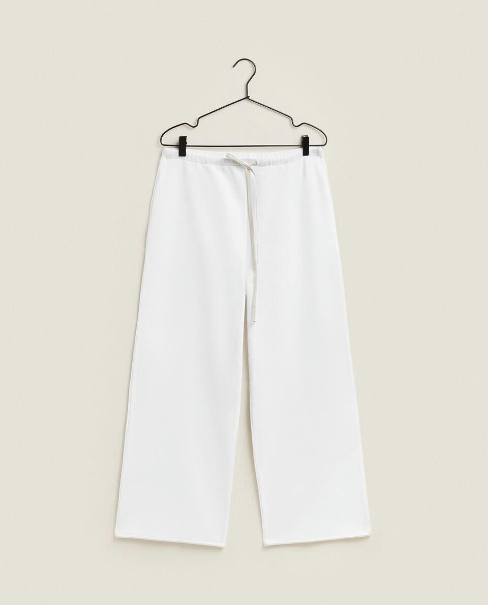 NAPPED TROUSERS WITH TRIM