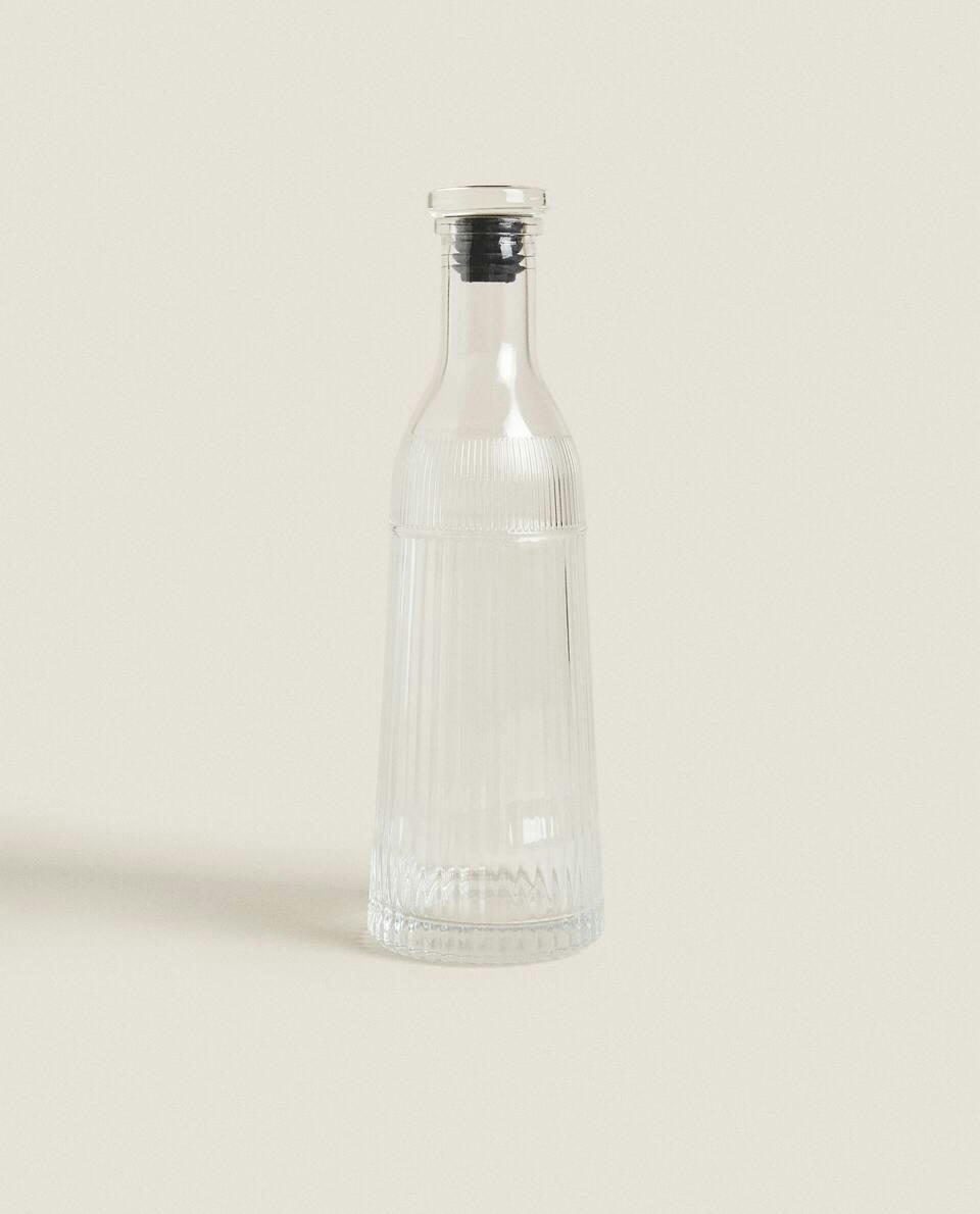 FACETED GLASS BOTTLE