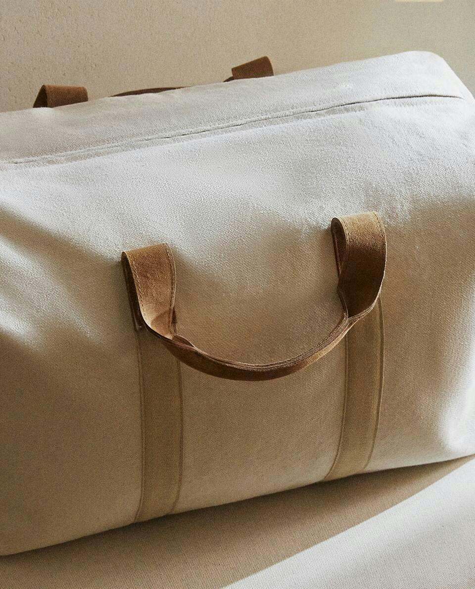 FABRIC TRAVEL BAG WITH LEATHER DETAIL