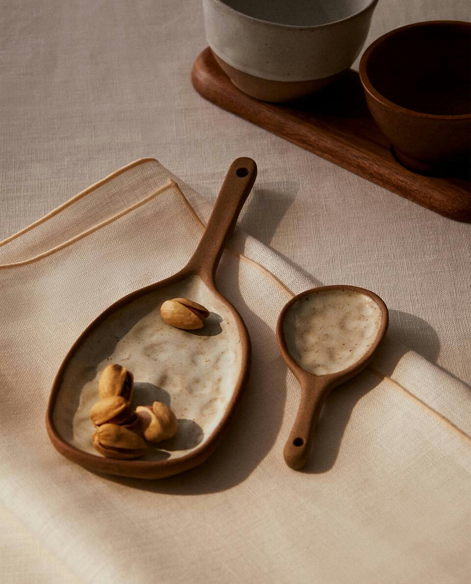 SPOON WITH RAISED DESIGN