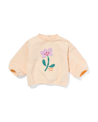 babysweater met bloem perzik
