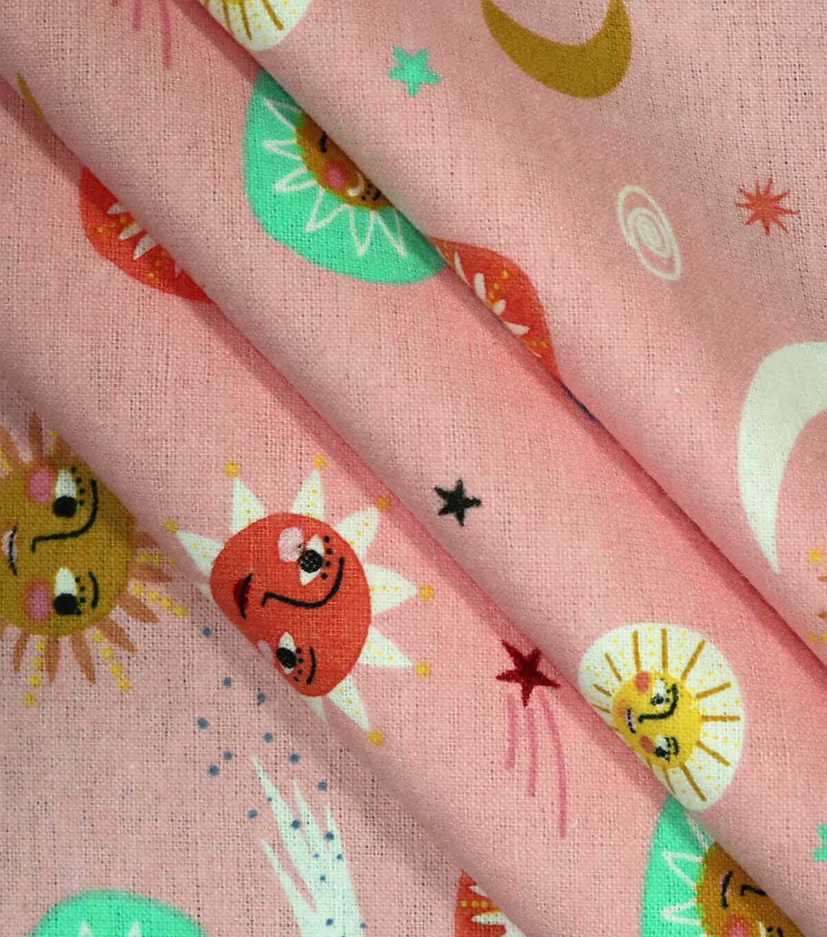 Small Suns & Moons On Pink Super Snuggle Flannel Fabric